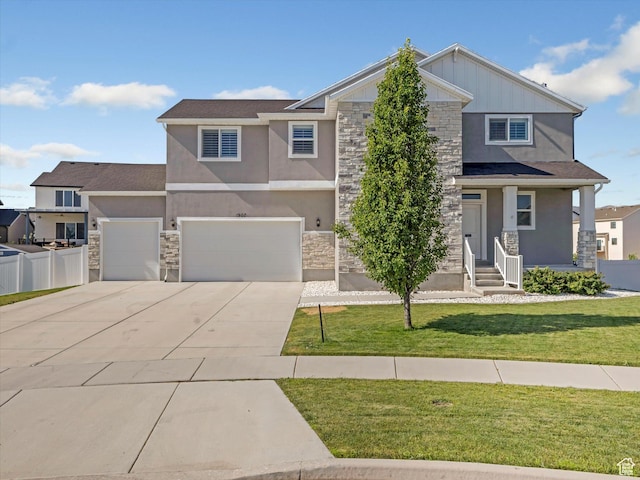 1907 E Brooklyn Cir N, Saratoga Springs, UT 84045 - craftsman-style house featuring stone siding, stucco siding, concrete driveway, board and batten siding, and an attached garage