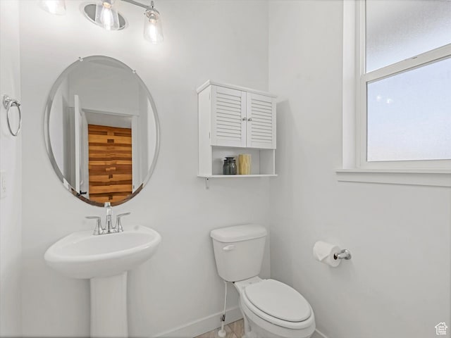 1907 E Brooklyn Cir N, Saratoga Springs, UT 84045 - bathroom with baseboards and toilet