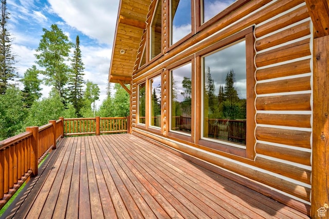 556 N Half Circle Dr, Brian Head, UT 84719 - wooden deck with view of wooded area