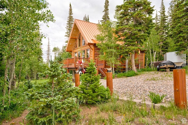556 N Half Circle Dr, Brian Head, UT 84719 - view of jungle gym featuring stairway and a wooden deck