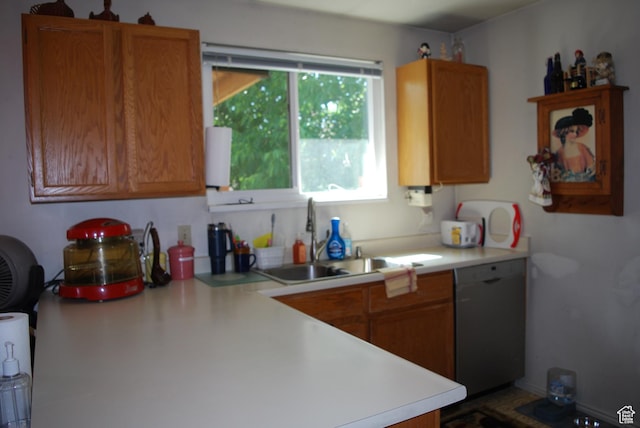 10642 S 1090 E, Sandy, UT 84094 - kitchen featuring dishwasher, light countertops, and brown cabinetry