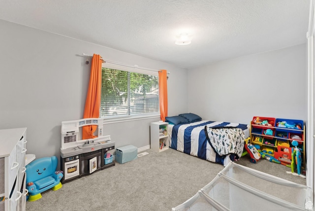 694 E 2350 N, North Ogden, UT 84414 - bedroom featuring carpet and a textured ceiling