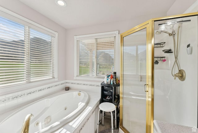 694 E 2350 N, North Ogden, UT 84414 - full bathroom with plenty of natural light, a shower stall, a tub with jets, and recessed lighting