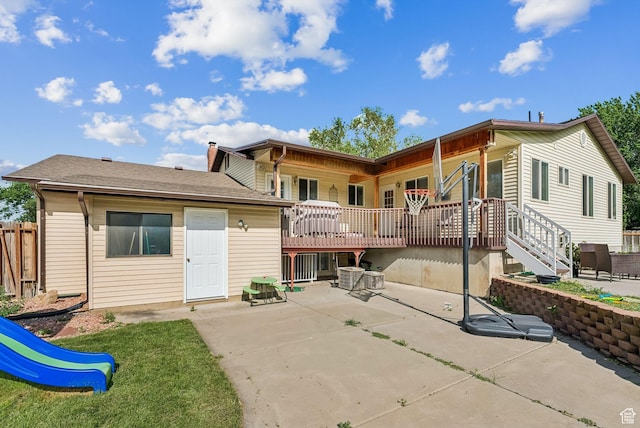 694 E 2350 N, North Ogden, UT 84414 - rear view of property featuring a patio, a playground, and a deck
