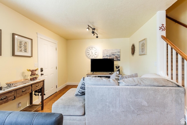 265 W 1010 S, Logan, UT 84321 - living room featuring wood finished floors and baseboards