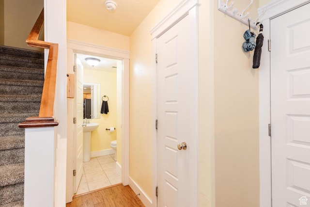 265 W 1010 S, Logan, UT 84321 - hallway with stairway and light wood-type flooring