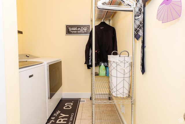 265 W 1010 S, Logan, UT 84321 - laundry area featuring independent washer and dryer and tile patterned flooring