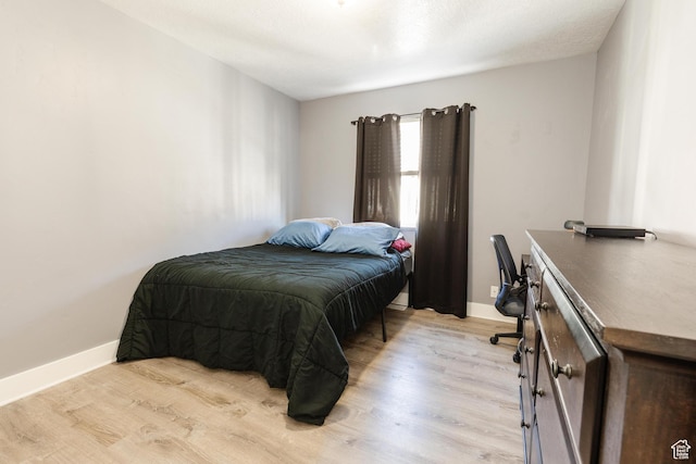265 W 1010 S, Logan, UT 84321 - bedroom with light wood-style floors