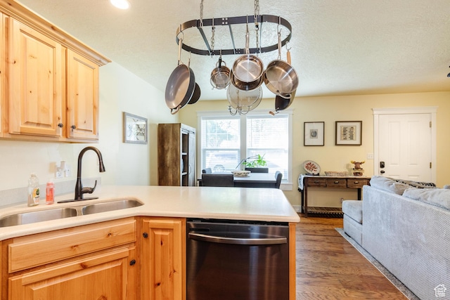 265 W 1010 S, Logan, UT 84321 - kitchen featuring dishwasher, a peninsula, light countertops, wood finished floors, and recessed lighting
