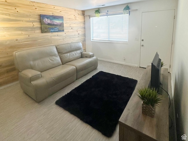 7143 S 2700 W Unit 1, West Jordan, UT 84084 - carpeted living room with wood walls and baseboards