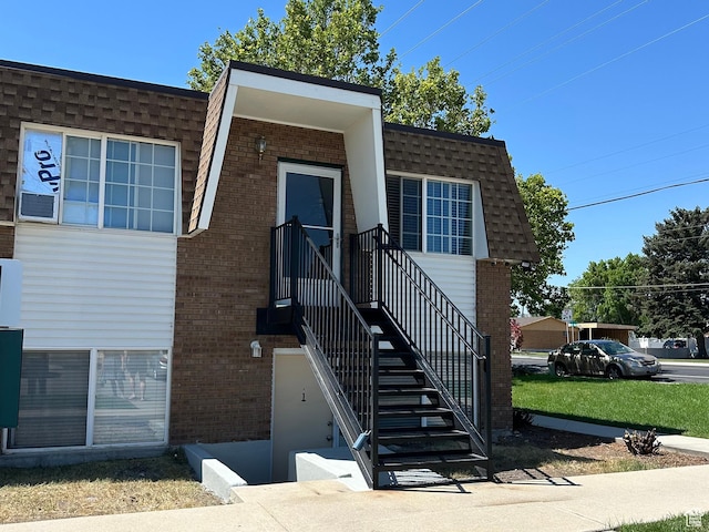 7143 S 2700 W Unit 1, West Jordan, UT 84084 - view of front facade with brick siding