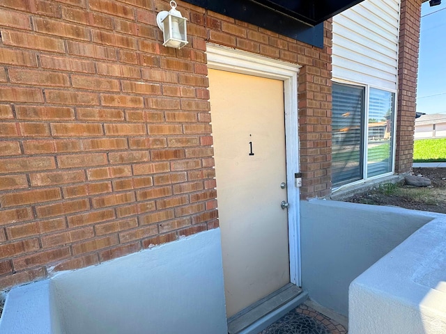 7143 S 2700 W Unit 1, West Jordan, UT 84084 - property entrance with brick siding