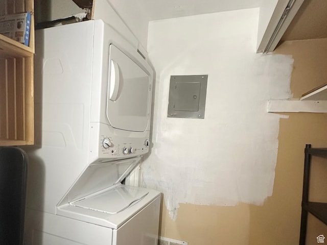 7143 S 2700 W Unit 1, West Jordan, UT 84084 - washroom featuring stacked washing machine and dryer and electric panel