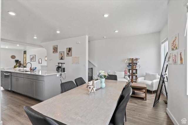 1098 E Vessel Ct, Saratoga Springs, UT 84045 - dining space featuring light wood-type flooring and recessed lighting