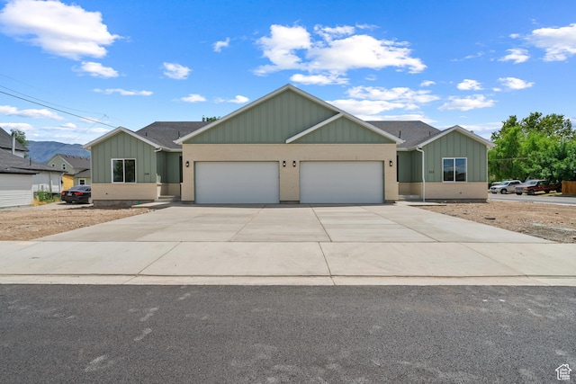 222 E 300 N, Payson, UT 84651 - view of front facade featuring a garage, driveway, and board and batten siding