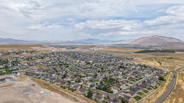 645 Stonebrook Ln, Santaquin, UT 84655 - aerial overview of property's location featuring a mountain backdrop and nearby suburban area