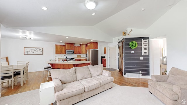 645 Stonebrook Ln, Santaquin, UT 84655 - living room featuring light wood-style flooring, lofted ceiling, and recessed lighting