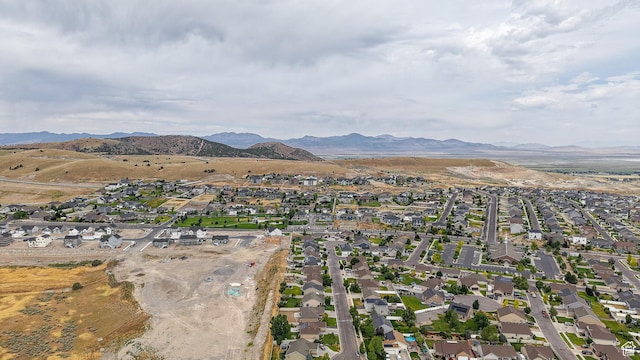 645 Stonebrook Ln, Santaquin, UT 84655 - aerial view of property and surrounding area featuring nearby suburban area and mountains