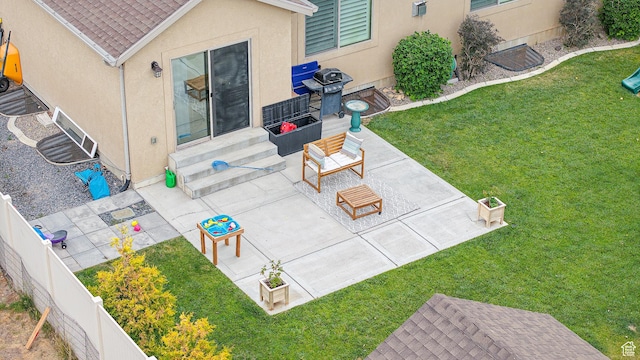645 Stonebrook Ln, Santaquin, UT 84655 - fenced backyard with entry steps, a patio area, and a grill