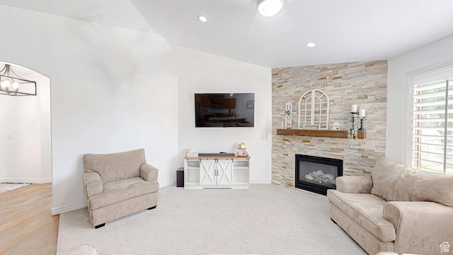 645 Stonebrook Ln, Santaquin, UT 84655 - carpeted living area with vaulted ceiling, a fireplace, a chandelier, and recessed lighting