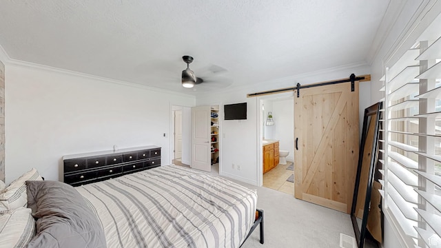 645 Stonebrook Ln, Santaquin, UT 84655 - bedroom featuring a barn door, light carpet, ornamental molding, ensuite bath, and ceiling fan