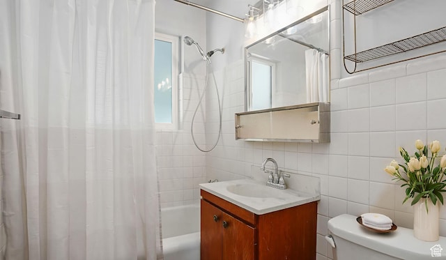 361 E Mcmillan Ln, Murray, UT 84107 - full bathroom featuring shower / tub combo, vanity, tile walls, and decorative backsplash