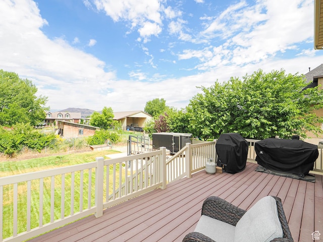 373 N Willow Haven Ave, Lehi, UT 84043 - wooden terrace featuring area for grilling, a storage shed, and a yard
