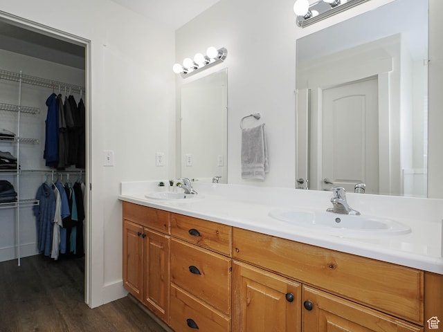 373 N Willow Haven Ave, Lehi, UT 84043 - bathroom with double vanity, wood finished floors, and a spacious closet
