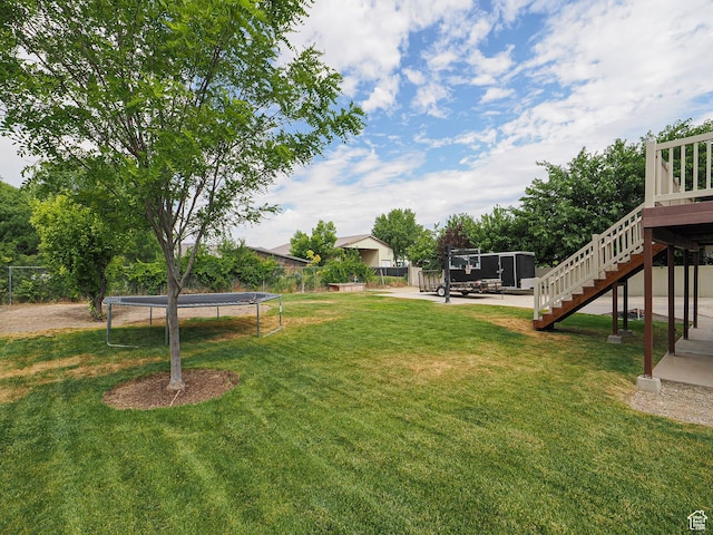 373 N Willow Haven Ave, Lehi, UT 84043 - view of yard with a trampoline, stairs, a deck, and a patio