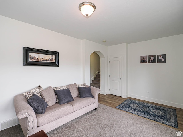 373 N Willow Haven Ave, Lehi, UT 84043 - living area with arched walkways, wood finished floors, and stairs
