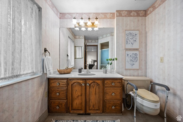 1575 W Alley St, Riverton, UT 84065 - bathroom featuring wallpapered walls, vanity, and a chandelier