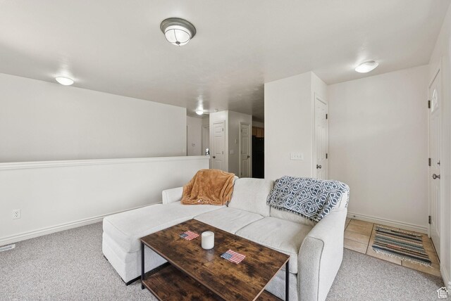 1884 E Shepard Ln, Lake Point, UT 84074 - carpeted living area featuring baseboards