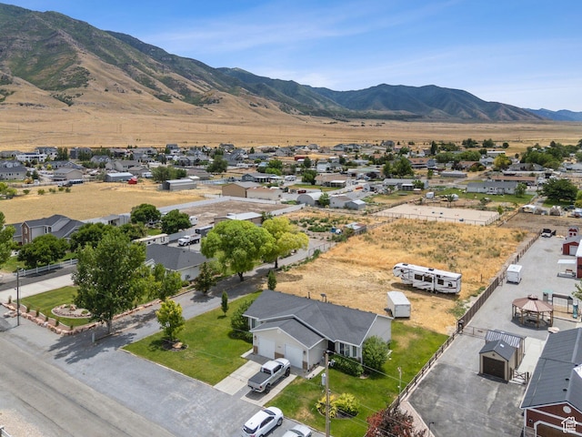 1884 E Shepard Ln, Lake Point, UT 84074 - aerial perspective of suburban area with mountains