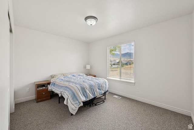 1884 E Shepard Ln, Lake Point, UT 84074 - carpeted bedroom featuring baseboards