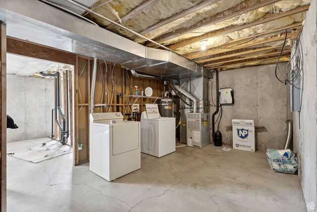 1884 E Shepard Ln, Lake Point, UT 84074 - unfinished below grade area with washer and clothes dryer, heating unit, and secured water heater