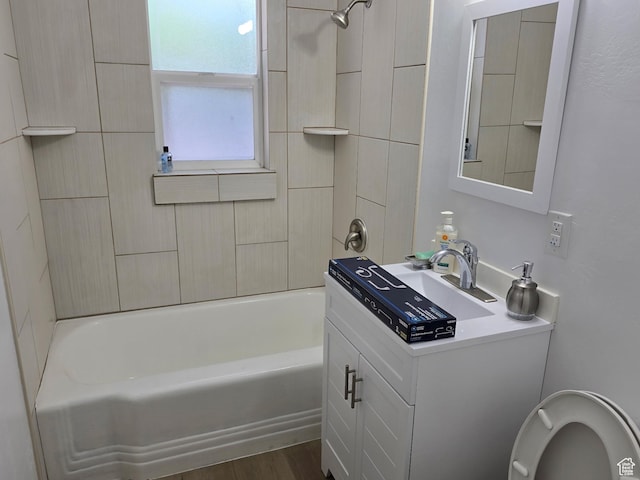1134 W Illinois Ave S, Salt Lake City, UT 84104 - bathroom with vanity, shower / washtub combination, and wood finished floors
