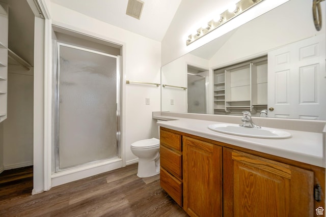 527 Applewood Dr, Bountiful, UT 84010 - bathroom with vanity, a stall shower, wood finished floors, and lofted ceiling