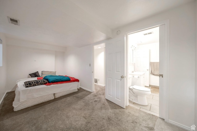 527 Applewood Dr, Bountiful, UT 84010 - carpeted bedroom with connected bathroom and baseboards