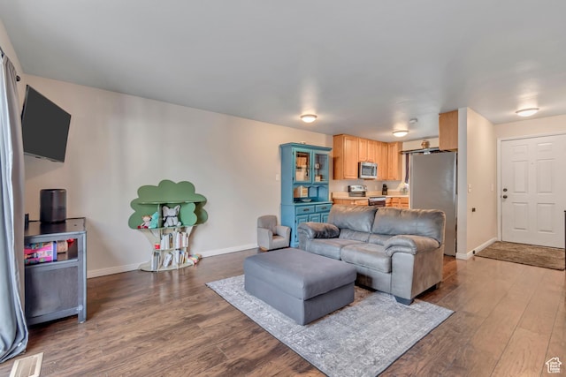 5235 S Glendon St Unit W3, Murray, UT 84123 - living area with dark wood-style floors and baseboards