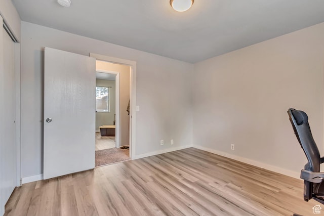 5235 S Glendon St Unit W3, Murray, UT 84123 - empty room featuring light wood-style floors and a smoke detector