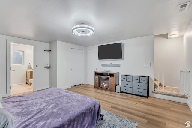 5235 S Glendon St Unit W3, Murray, UT 84123 - bedroom with wood finished floors and connected bathroom