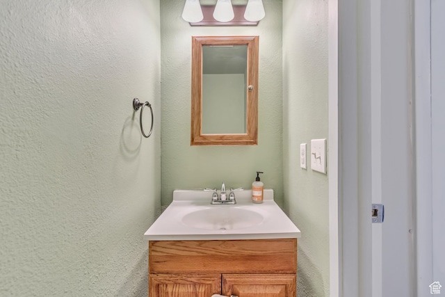 5235 S Glendon St Unit W3, Murray, UT 84123 - bathroom featuring vanity and a textured wall