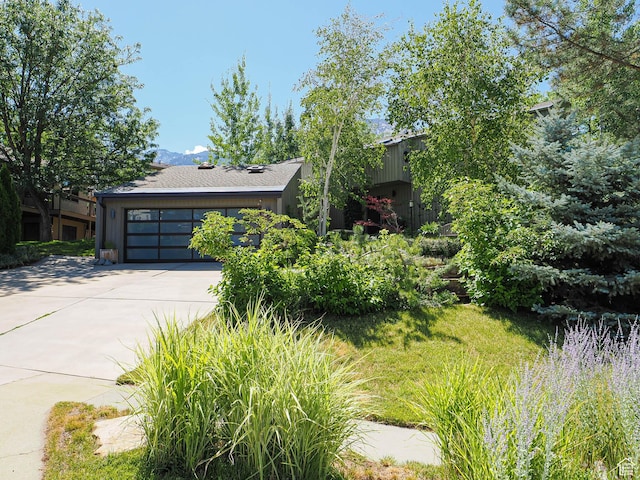 3348 E Splendor Cir, Holladay, UT 84124 - view of front of home featuring concrete driveway and a garage