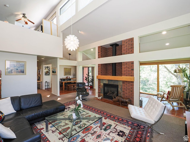 3348 E Splendor Cir, Holladay, UT 84124 - living area featuring a towering ceiling, ceiling fan, recessed lighting, carpet flooring, and a fireplace