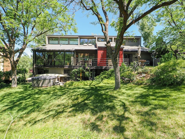 3348 E Splendor Cir, Holladay, UT 84124 - rear view of house with a hot tub, a yard, and a deck
