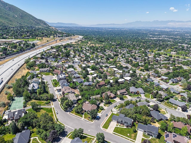 3348 E Splendor Cir, Holladay, UT 84124 - aerial view of property's location with a mountain backdrop and nearby suburban area