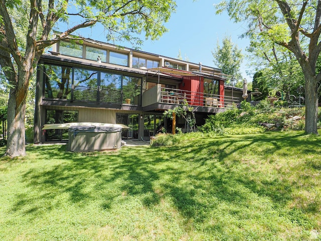 3348 E Splendor Cir, Holladay, UT 84124 - back of house featuring a hot tub, a yard, and a deck