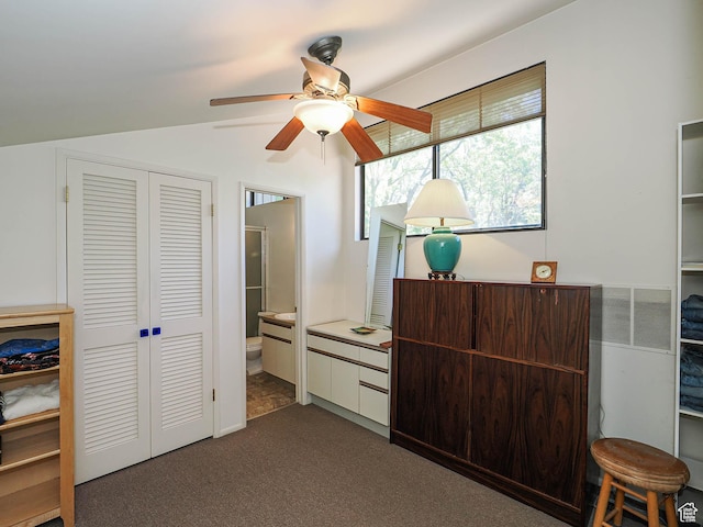 3348 E Splendor Cir, Holladay, UT 84124 - bedroom featuring a closet, dark colored carpet, lofted ceiling, ensuite bath, and ceiling fan