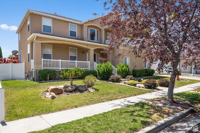 5453 W Mayflower St, West Jordan, UT 84081 - view of front facade with a porch and stucco siding