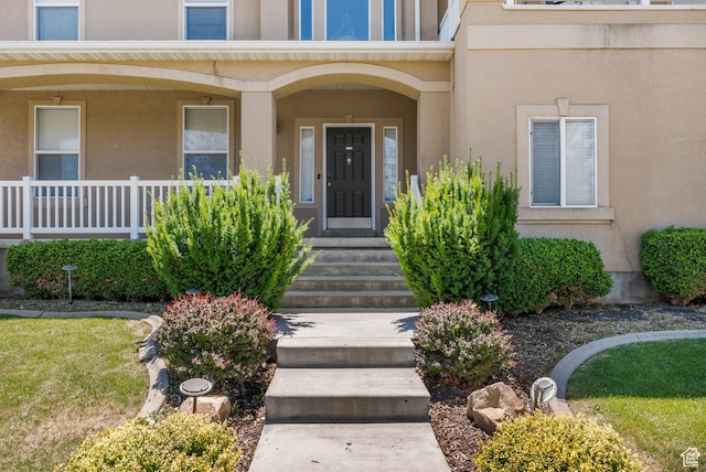 5453 W Mayflower St, West Jordan, UT 84081 - property entrance featuring stucco siding and covered porch